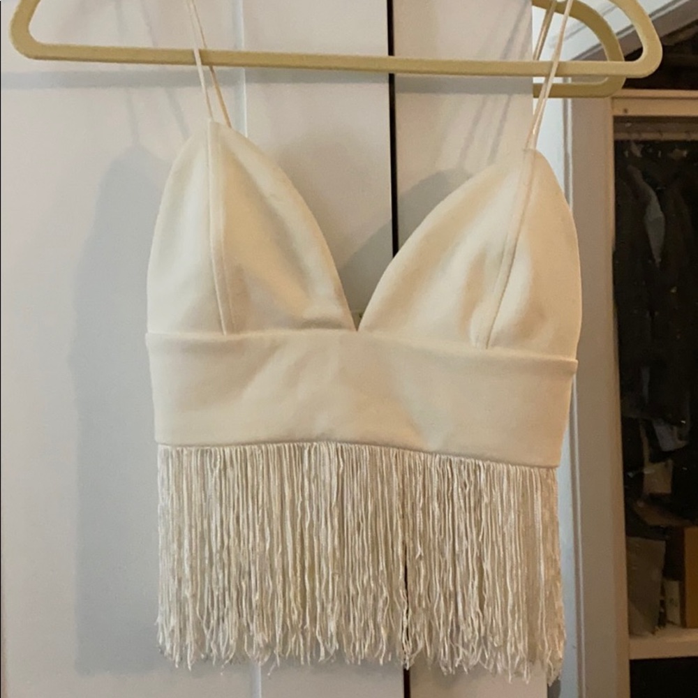 Fun fringed-bottom top with deep V